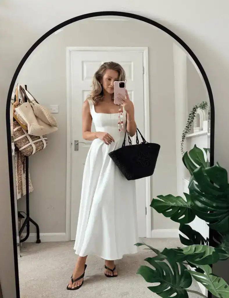 woman wearing a white square neck midi dress. old money outfit
