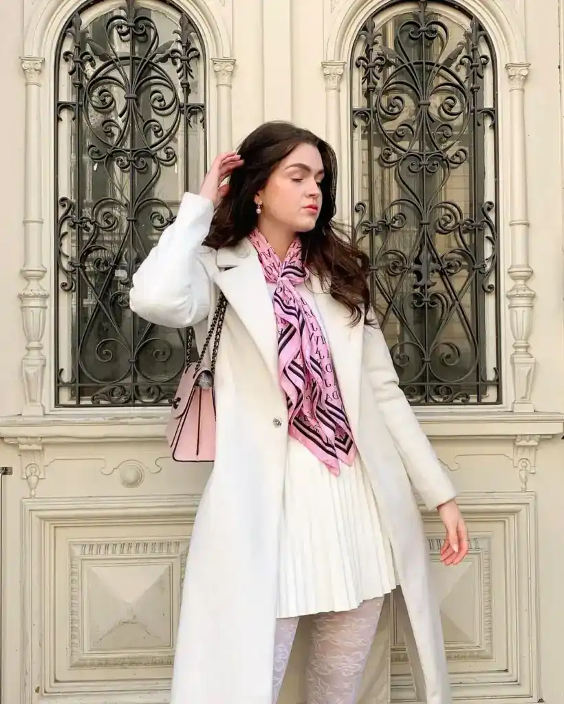 all-white balletcore outfit with a pink neck scarf outfit