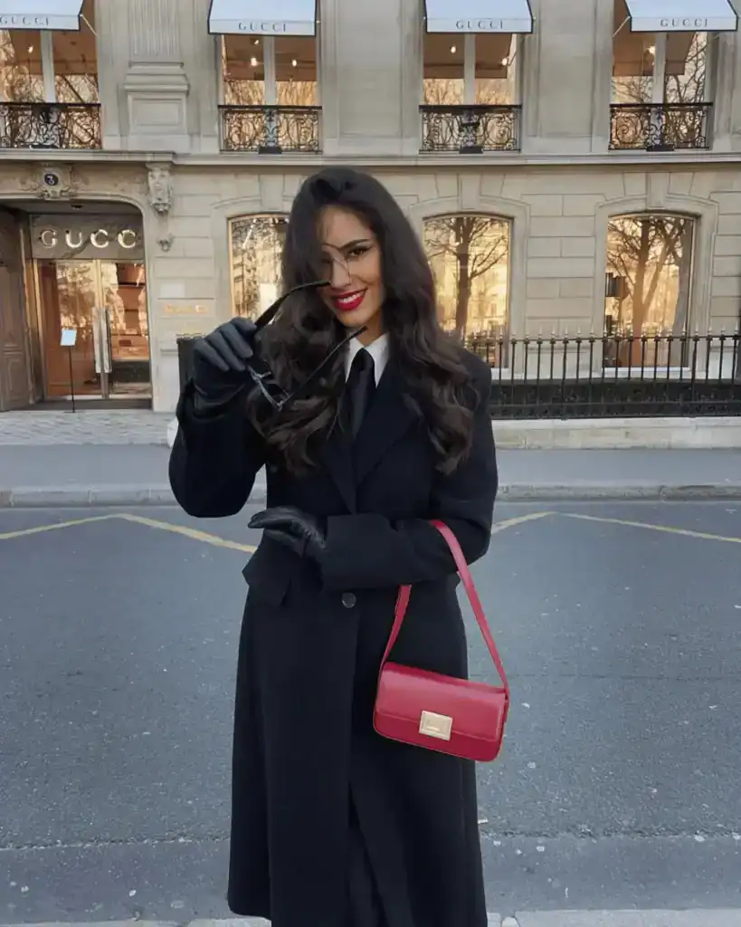 black trench coat and red handbag old money outfit