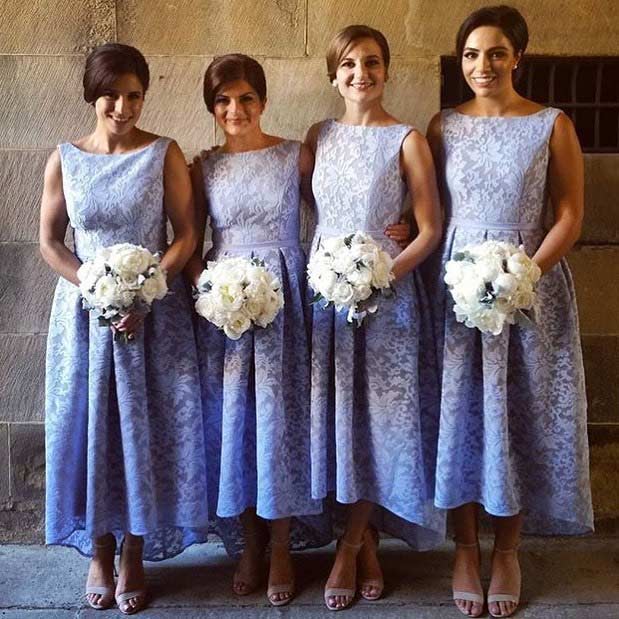 Pastel Bridesmaid Dresses with White Bouquets