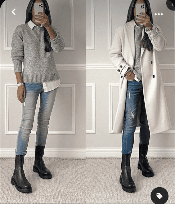 Chic winter outfit with gray sweater, blue jeans, cream coat, and black ankle boots for women.