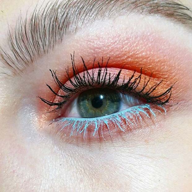 Bold Orange Eye Shadow and Blue Mascara Makeup Idea for Spring