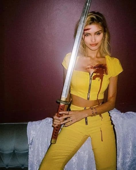 sexy costumes for halloween all dressed in yellow with splattered blood