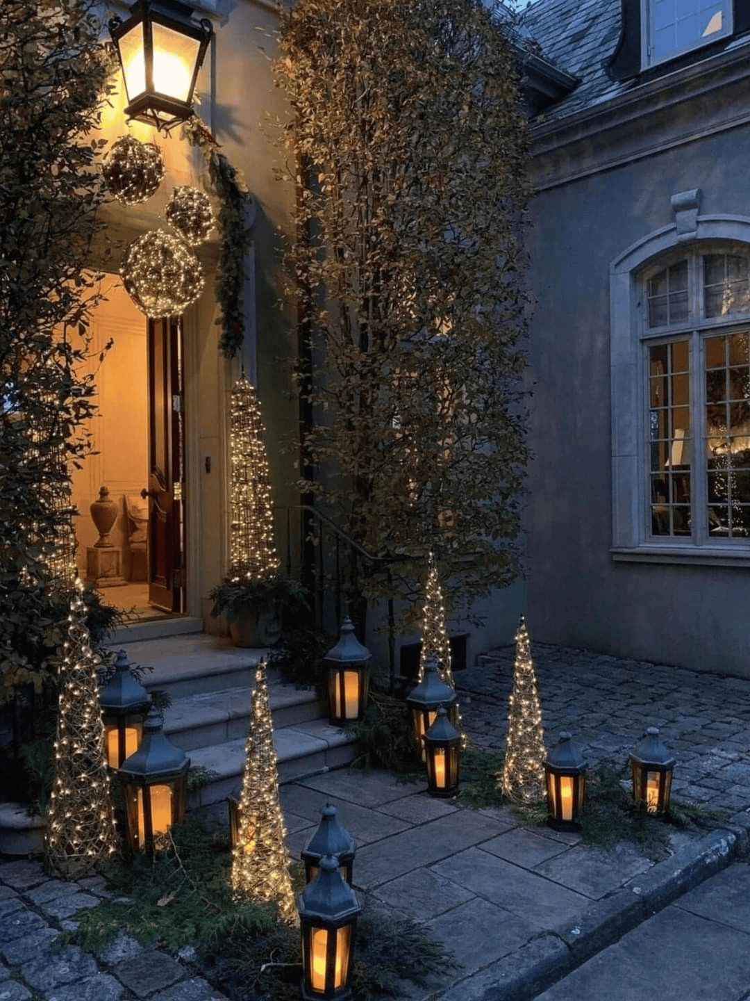 Courtyard Lights and Christmas Trees Illuminate Outdoor Space