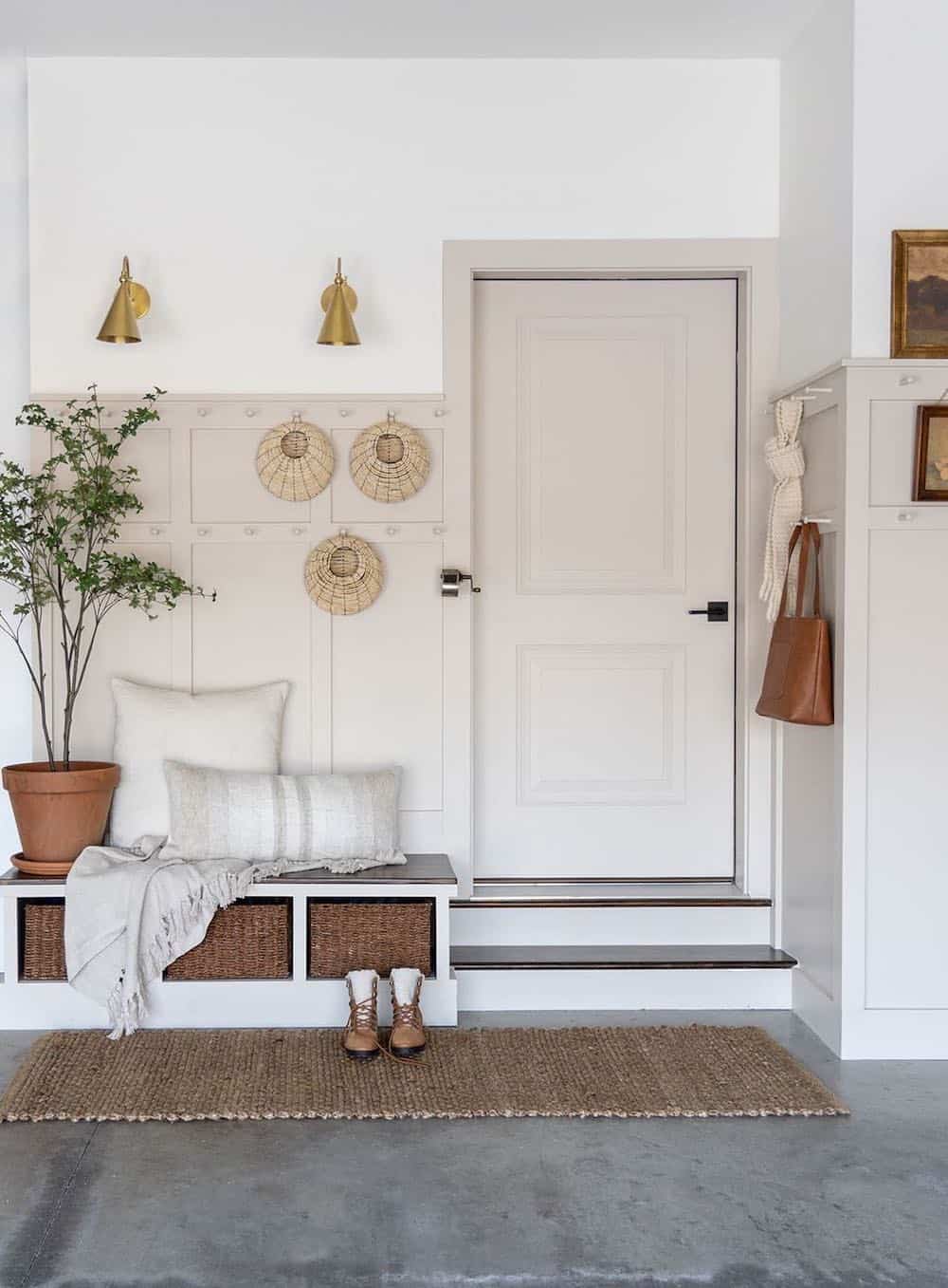 an organized garage featuring an entryway design