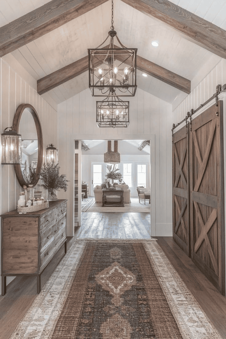 High Ceilings And Chandeliers Highlight The Entryway
