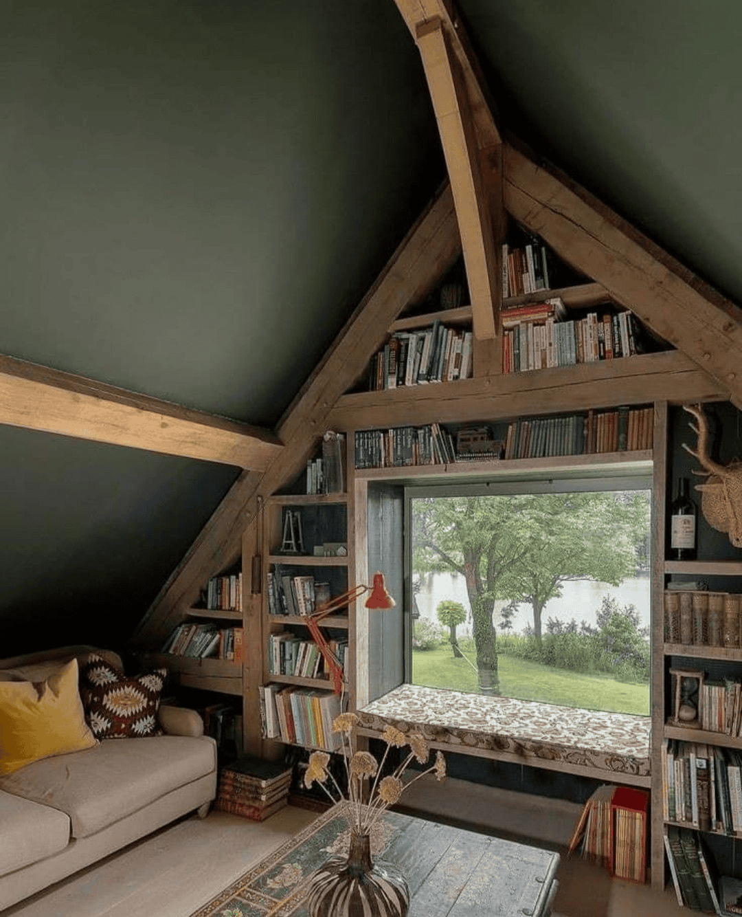 Peaceful Woodland Reading Nook with Bookshelves and Sofa