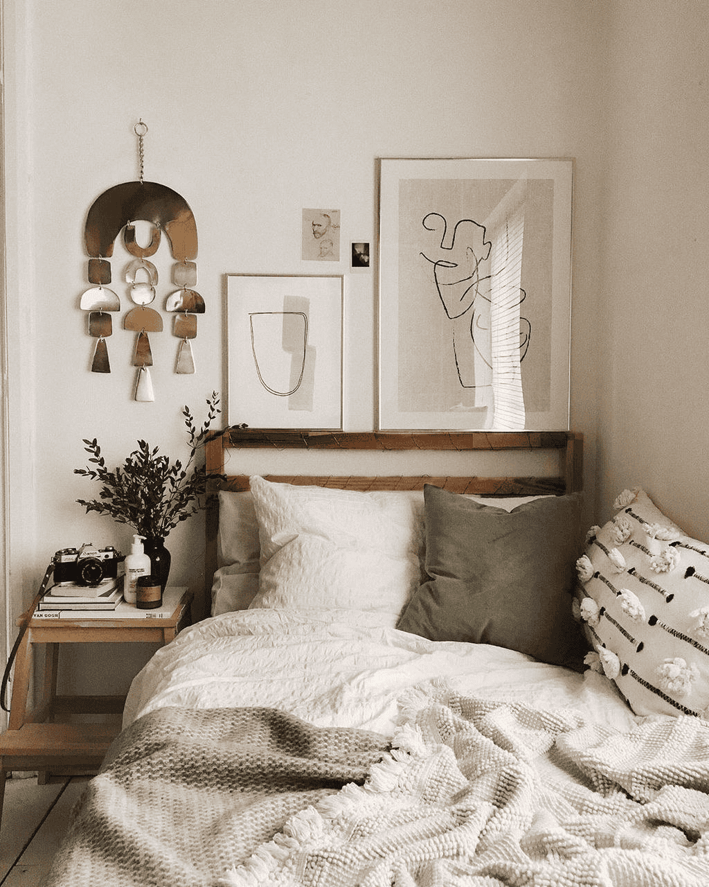 Simple Artworks and Comfortable Bedding Create Tranquility
