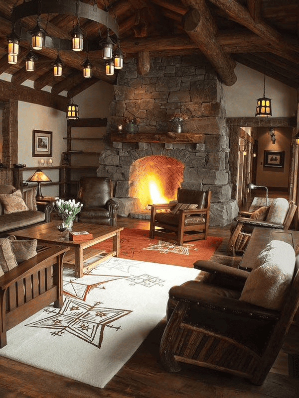 Stone Fireplace and Lanterns Warm a Cozy Living Room